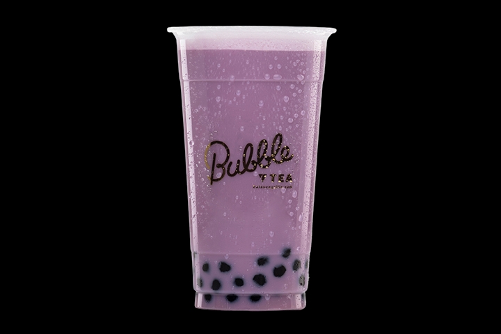 Vibrant purple bubble tea at Balance Grille, featuring customizable flavors and toppings.