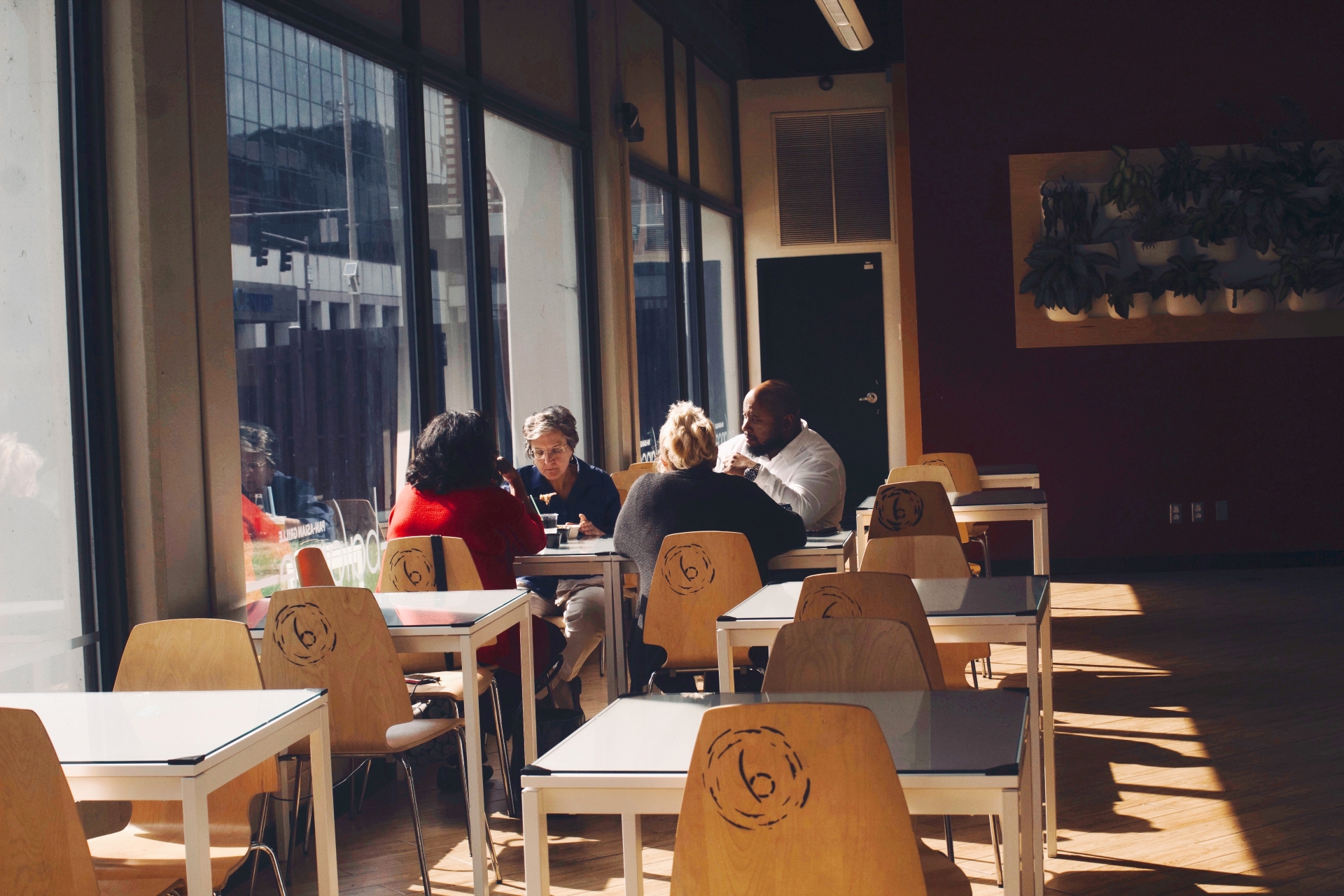 Cozy modern dining space inside Balance Grille, a vegan-friendly Asian fusion restaurant in Cleveland.