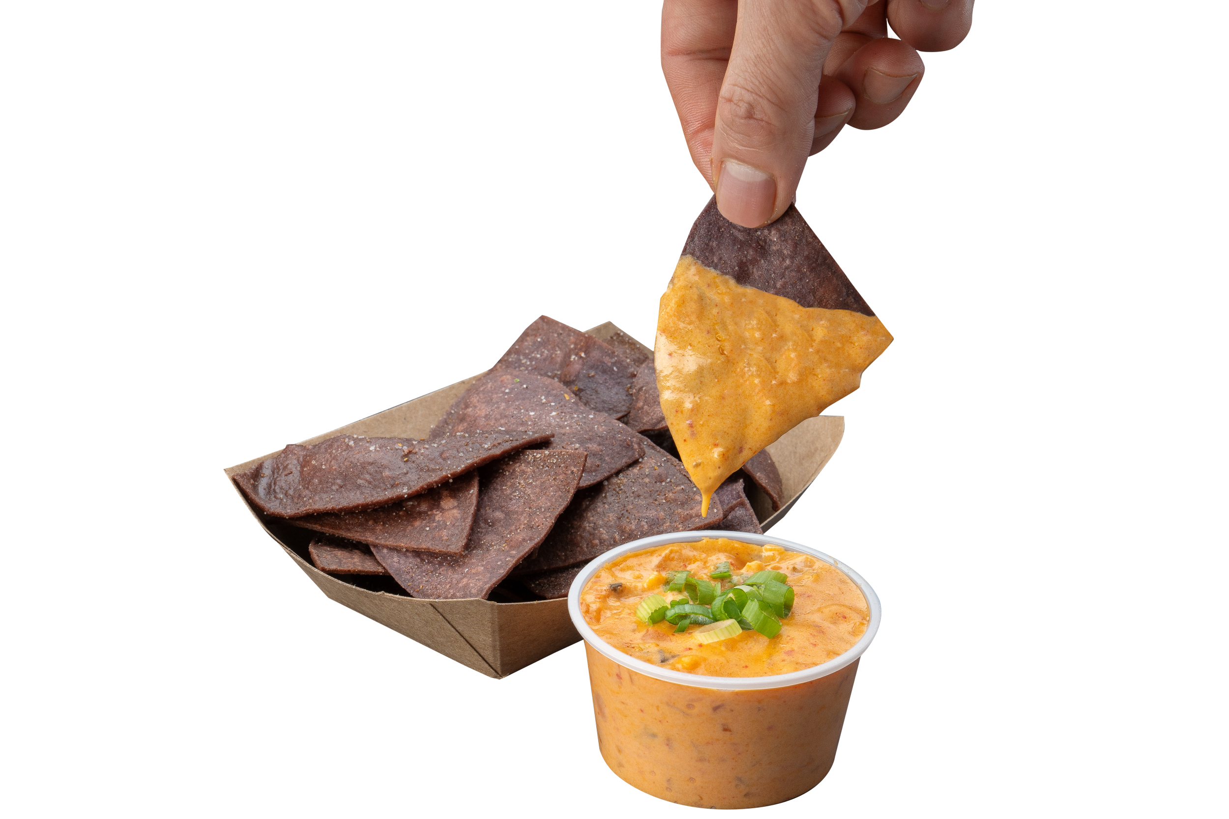 A creamy, cheesy Kimchi Queso dip served with citrus-seasoned blue corn tortilla chips.